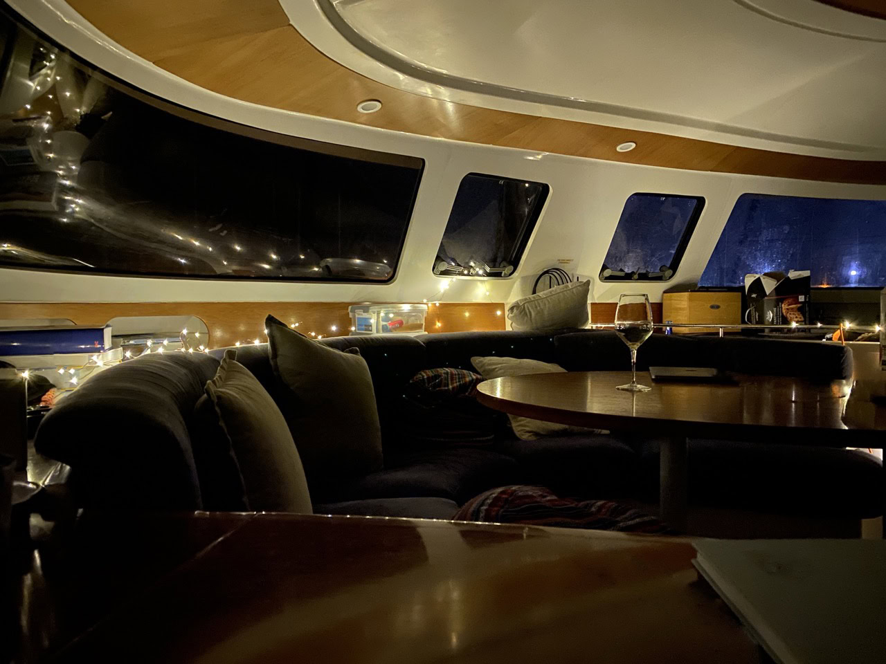 Elegant interior of the SV Monika luxury catamaran with plush seating and ambient lighting.
